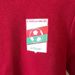 rode sweater met kap