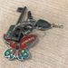 3 sleutels + vlinder sleutelhanger