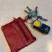 DS autosleutel + 4 huissleutels + rood tasje